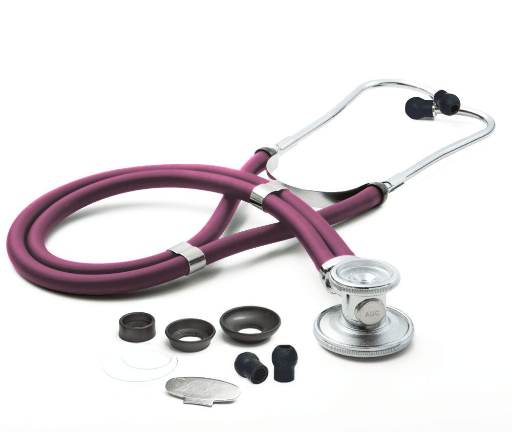 Purple stethoscope with spare earpieces and parts