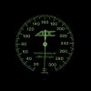 Green-lit aircraft cockpit instrument gauge